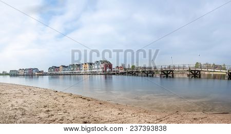 In The Town Of Houten, These Beautifully Painted Houses Are On The Water