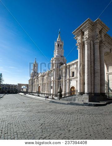 AREQUIPA PERU NOVEMBER 9: Main square of Arequipa with church on november 9 2015 in Arequipa Peru. Arequipa's Plaza de Armas is one of the most beautiful in Peru.