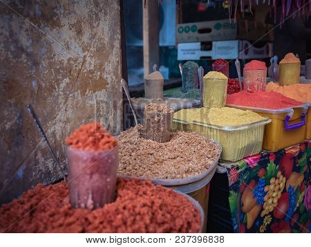 Various Spices From The Street Market. Colorful Georgian Suneli On Glasses In A Row. Oriental Spices