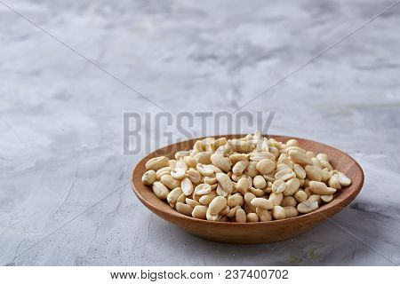 Pile Of Peelled Peanuts Isolated On White Textured Background, Background, Top View, Close-up, Selec