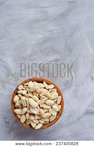 Pile Of Peelled Peanuts Isolated On White Textured Background, Background, Top View, Close-up, Selec