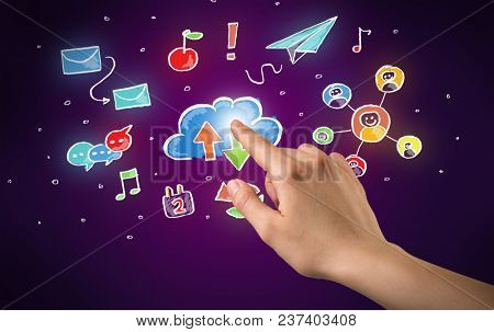 Female hand toucing mixed media icons with purple background