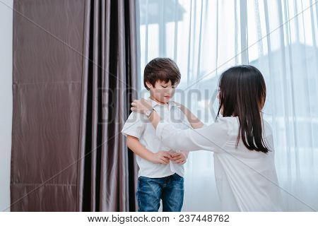 Mother Dressing Up A Son For Beginner School Lessen And First Day At Room To Going Kindergarten Educ