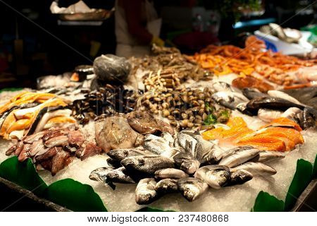 The Counter On The Market, Seafood On Ice, Mussels, Salmon, Snapper. The Boqueria Market In Barcelon