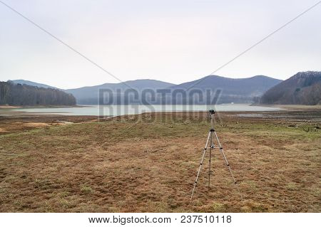 Panoramic View Of The Vladivostok City Reservoir Of Lake Sedanka And A Tripod Prepared For Shooting.