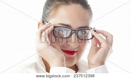 Closeup Isolated Portrait Of Sexy Woman In Eyglasses And Red Lipstick Looking In Camera