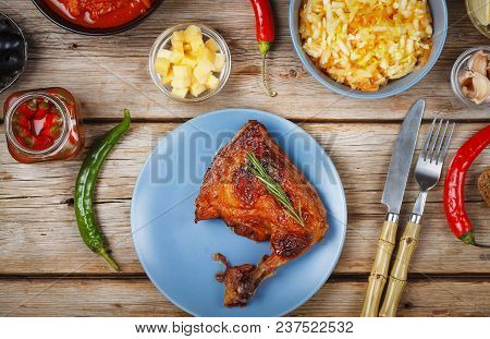 Dinner Table. Various Dishes And Snacks On A Wooden Antique Table With Chicken Barbecue And Lager Be