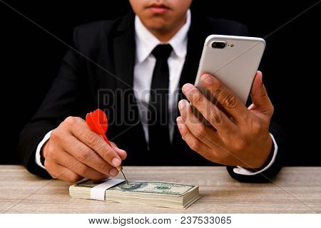 Finance Business Concepts. Lots Of Money On A Black Background. Investments Are A Necessity Of Busin