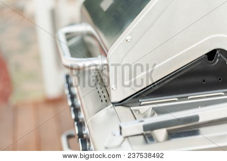 Outdoor Gas Grill On Ack Pation Is Outdoors In Spring.