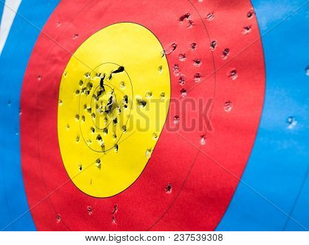 Close Up Archery Target With Many Arrow Holes