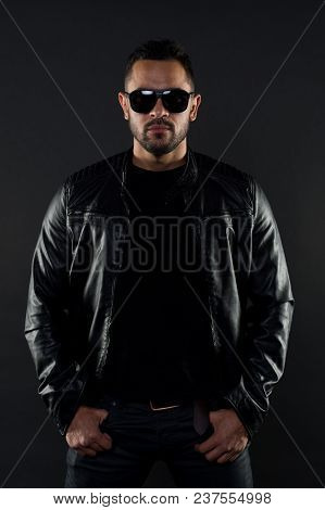 Brutal Macho In Leather Jacket. Bearded Man In Fashion Sunglasses. Mens Sexuality And Attraction. Fa