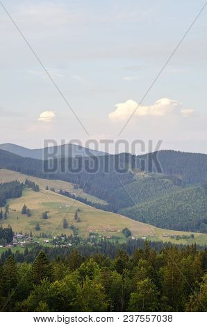 Mountain Landscape Witn Hightland Village In The Carpathian Mt.