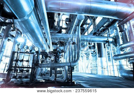 Equipment, Cables And Piping As Found Inside Of A Modern Industrial Power Plant