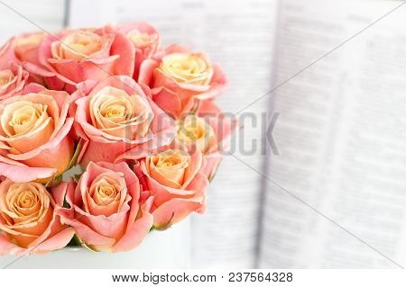 Roses In A Round Box And The Bible. Beautiful Pink Roses On A White Wooden Background. Beautiful Pin