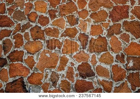 Part Of Stone Wall For Background Or Texture. Stone Cladding. Background Of Stone Wall Texture. Ston