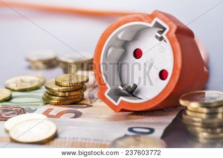 Socket With Several Euro Coins And Banknotes