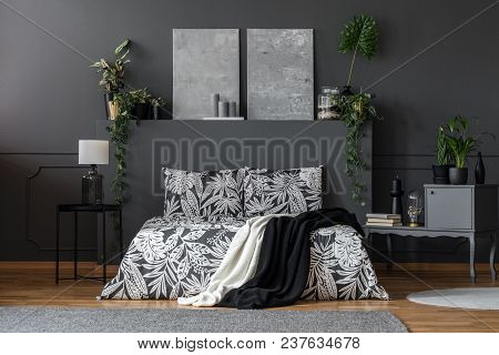 Two Blankets Thrown On Bed