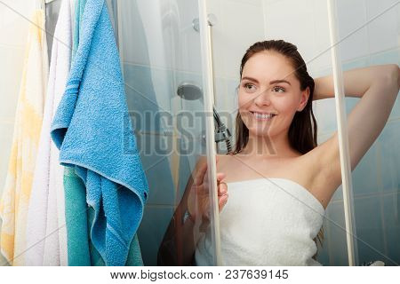 Girl Showering In Shower Cabin Enclosure. Woman Taking Care Of Hygiene In Bathroom.