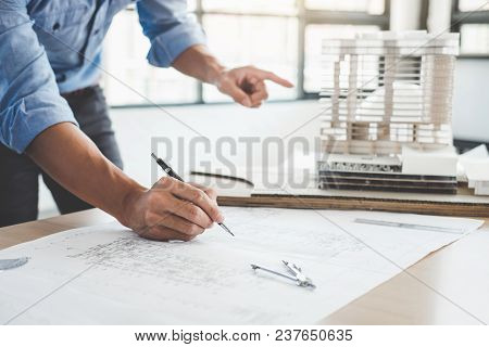 Construction Concept, Hands Of Architect Or Engineer Working For New Project Plan On Blueprint, Mode