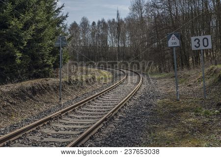 Railroad Track Near Horni Slavkov Town In Spring Cloudy Day