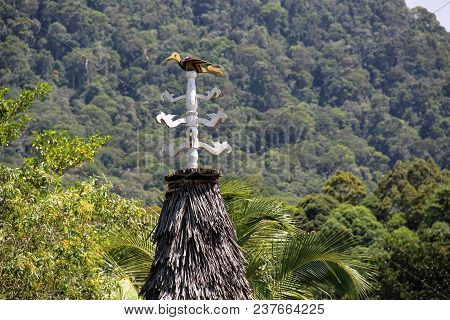 Wooden Hornbill On Roof Of Bidayuh Tribal House In Sarawak Borneo