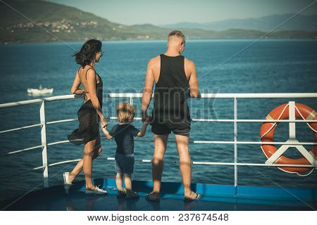 Family Travelling On Cruise Ship On Sunny Day. Family With Cute Son On Summer Vacation. Father, Moth