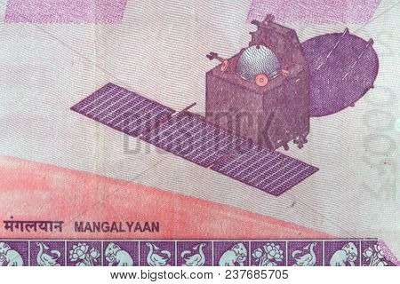 Close up shot of Indian probe Mangalyaan on 2000 Rupees note.