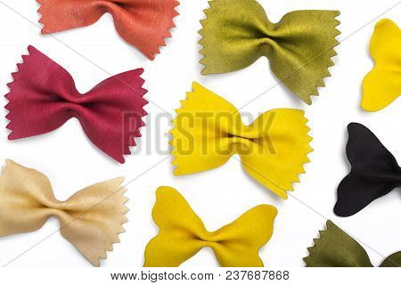 Handmade Multi-colored Paste In The Shape Of A Bow On A White Background Close-up