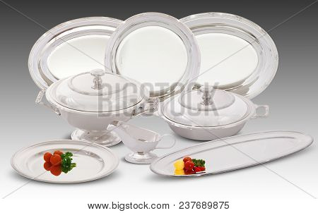 Set Of Silver Backing Trays On White Background