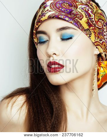 Young Pretty Modern Girl With Bright Shawl On Head Emotional Posing Isolated On White Background, As