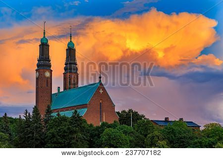 Colorful Sunset At Hogalid Church In The Sodermalm District Of Stockholm, Sweden. It Is One Of The M