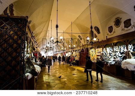 Krakow, Poland - Circa January, 2014: The Crowded Cloth Hall Gallery, Or Sukiennice, Located On Ryne