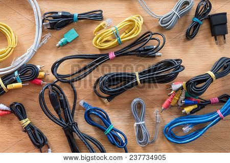 Wires, Cords And Cables Bonded With An Elastic Band On The Floor