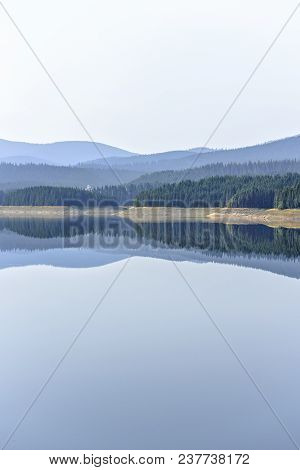 Daylight Misty View To Oasa Dam Lake With Mountains