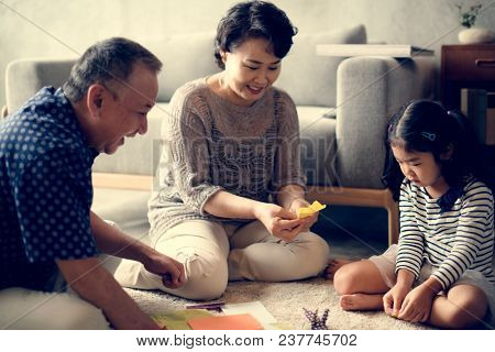 Grandparent palying with niece at home