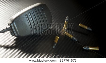 Five Rim Fire Cartridges With A Police Style Microphone