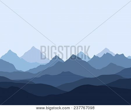 Panoramic View Of The Mountain Landscape With Fog In The Valley Below With The Alpenglow Blue Sky - 