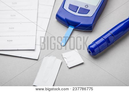 Diabetes Mellitus, Increased Blood Sugar Levels. Gray Background.