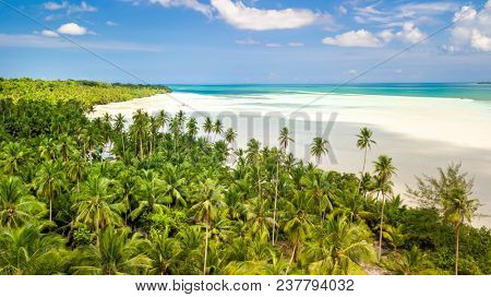 Aerial shot of the deserted and large tropical Ohoidertawun beach, Kei Kecil island, Maluku, Indonesia