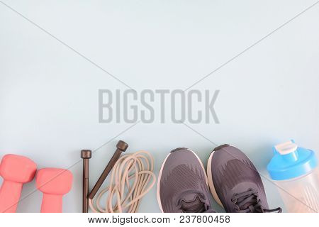 Fitness Background. Sports Equipment On A Blue Background. Place For Text, Copy-space.