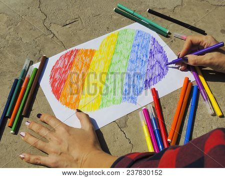 Photo Of The Rainbow Heart On The Asphalt. Symbols Of Lgbt People.
