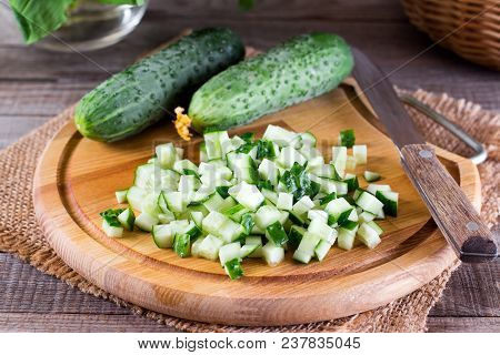 Fresh Cucumber Cubes On A Cutting Board On The Table