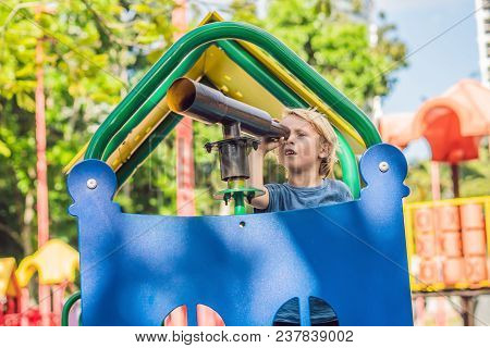 Funny Cute Happy Baby Playing On The Playground. The Emotion Of Happiness, Fun, Joy.