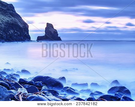 The Rest Of The Day In Rocky Bay. Evening Light On The Rocks, Boulders And Cliff Face Of Talisker Ba