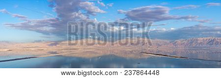 Sunset Over Lowest Salty Lake In World Below Sea Level Dead Sea, Full Of Minerals Near Luxury Vacati