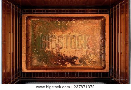 A Cross Section Top View From Above An Empty Hot Operational Household Oven With An Empty Tanished B