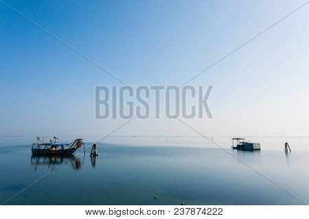 Fishing Boats Inside Po River Lagoon, Italy. Italian Landscape. Minimal Water Panorama