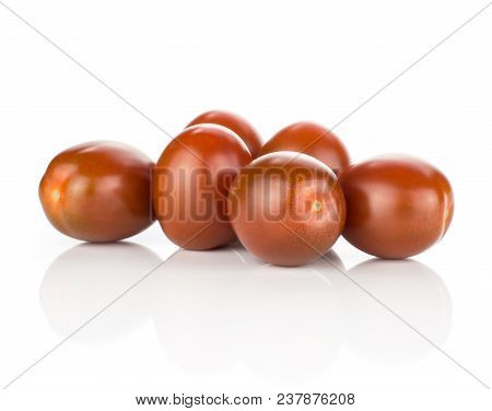 Six Black Red Grape Cherry Tomatoes Isolated On White Background