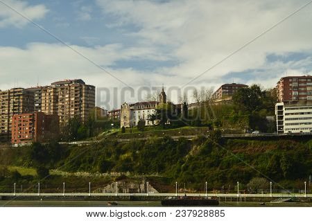 View Of The Church Of Porugalete From Getxo. Architecture History Travel. March 25, 2018. Bridge Of 