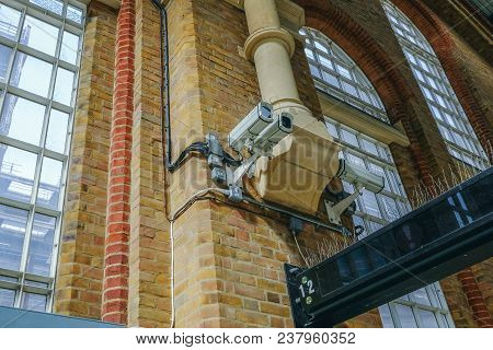 London, Uk - April 6, 2018:  Security Cameras Mounted Up On A Wall In Liverpool Street Mainline Stat